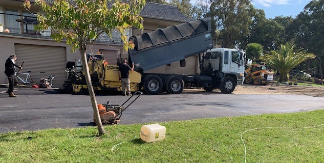 This is a photo of an asphalt driveway which is in the process of being installed by Bathurst Road Tek